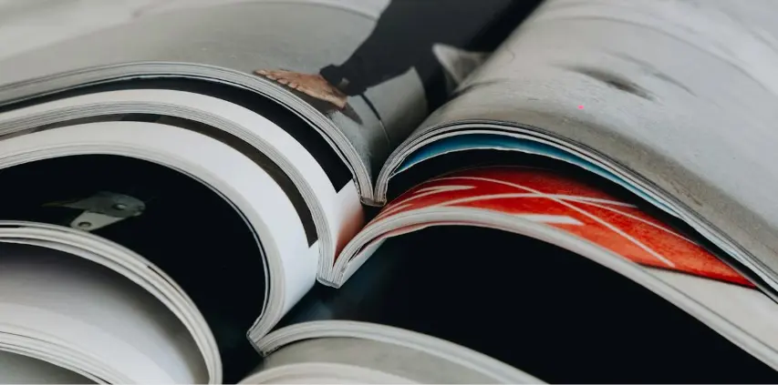 Printed catalog pages bound together as a magazine